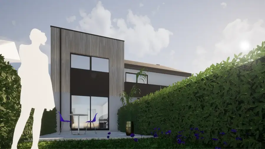 Extension d'une habitation et transformation d'un garage en une habitation