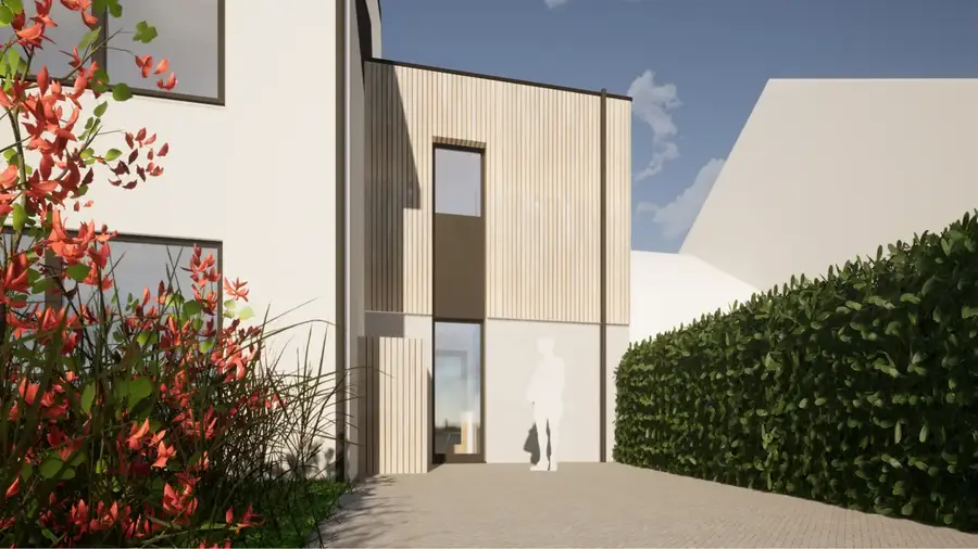 Extension d'une habitation et transformation d'un garage en une habitation