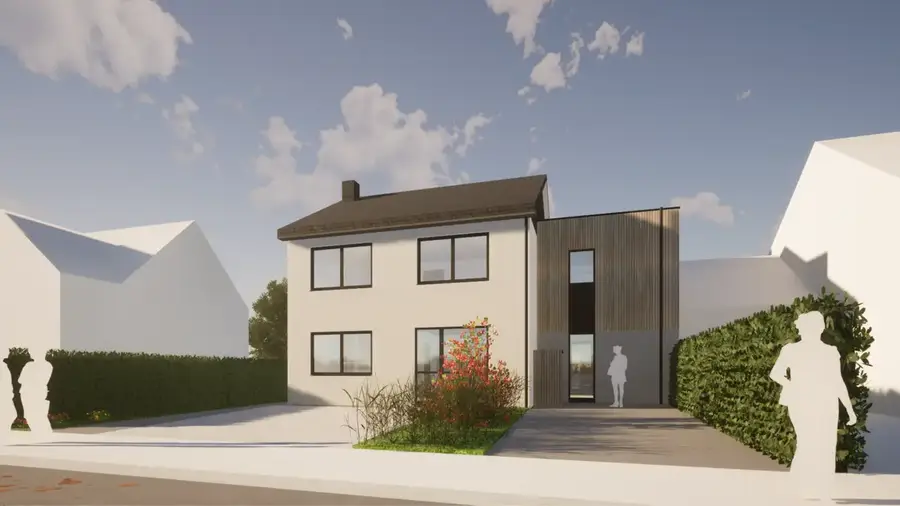 Extension d'une habitation et transformation d'un garage en une habitation